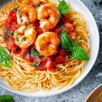 Knoblauch-Garnelen-auf-Spaghetti-mit-Tomatensauce-Rezept